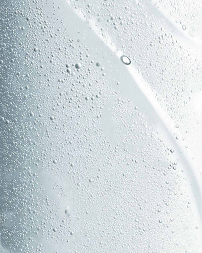 Close-up of a textured white surface with small bubbles