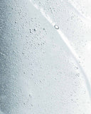Close-up of a textured white surface with small bubbles