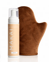 Makai tanning bottle and mitt on a white background