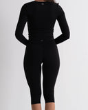 SoftSculpt Crossover Wrap Long Sleeve Top in Black, back view | MAKAI