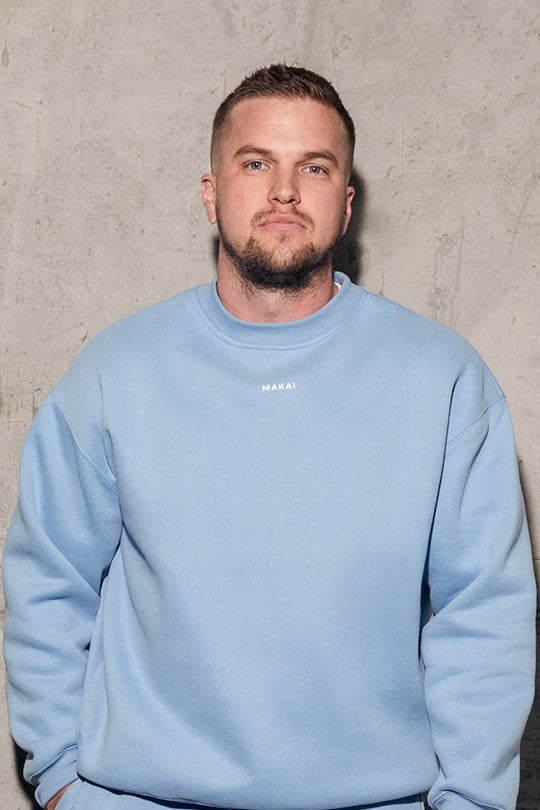 blue crewneck sweatshirt
