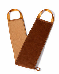 Brown leather bottle holder with tan handles on a white background