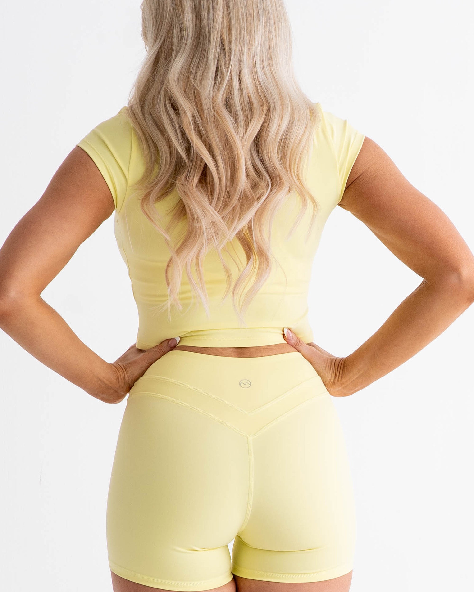 SoftSculpt Cap Sleeve Crop Tee in Lemon Drop Yellow, back view | MAKAI
