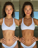 Side-by-side comparison of a woman wearing a white sports bra and shorts.